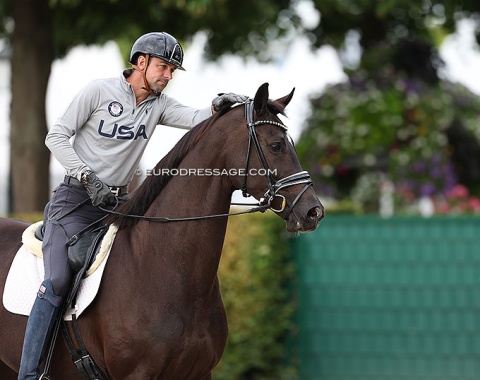 4* tour rider Marcus Orlob walks Jane in the morning