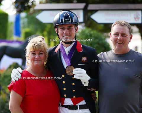 Harrison Ashton and his parents beaming