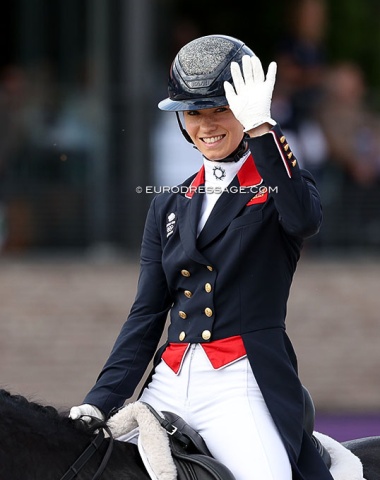 Charlotte Fry waves to the fans