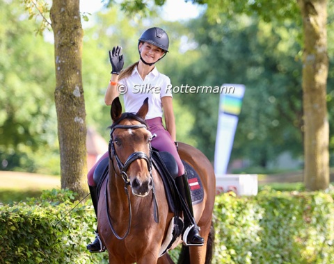 Latvia’s Alise Muizniece hacking her Belissimo mare Baily