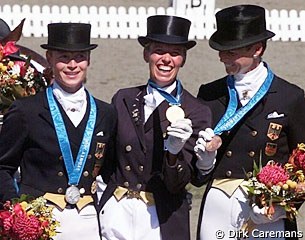 Gold shimmers more than silver.. Ulla Salzgeber, the 2000 Olympic bronze medallist, shares Anky's joy. The feeling of having this symbol hanging round her neck must be amazing.