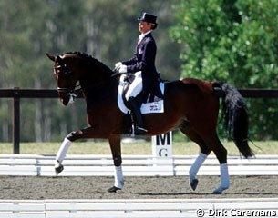 Bonfire being prepared in the warm-up ring for the final test in his life. "Something Old, Something New", a new custom made kur to music, has to launch the combination to international dressage stardom and the 2000 Olympic individual gold medal.