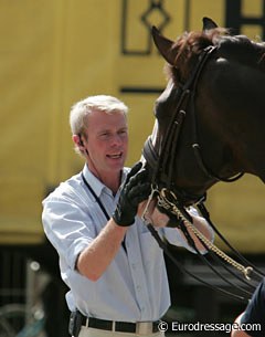 Jan Brink cuddling with Briar before he starts a schooling session