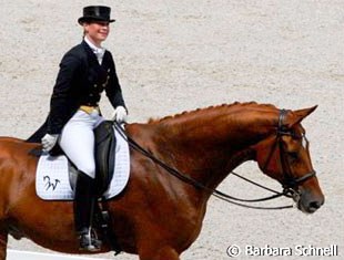 Isabell Werth is not even able to do her Special. She had to flee inside and ride again half an hour later. Warum Nicht couldn't keep his nerves and puts down a mediocre Special, but Werth takes it with good grace and smiles at the crowds.