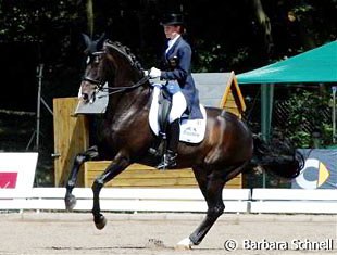 Anna Katharina Luttgen winning the Intermediaire I aboard Habitus.