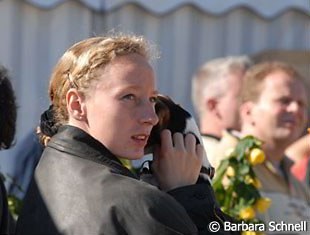 Jana Freund watching the horses she'll have to judge as guest judge rider later on.