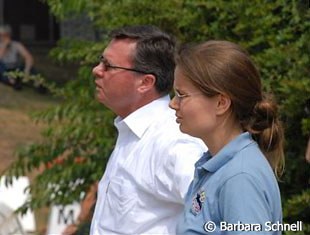 Chef d'Equipe Holger Schmezer watching all the rides. Nadine Capellmann's groom Sabine Domhöver joins him here.