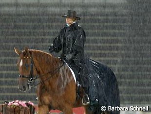 Rain Rain Go Away. Nadine Capellmann and Elvis in the pouring rain :: Photo © Barbara Schnell