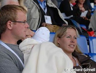 Danish team rider Anders Dahl with his newborn baby Mette, girlfriend and mom Fiona Bigwood next to him