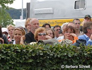 Fans crowd around the training ring to watch their idols