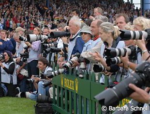 The hardest working people at the show under the worst conditions! Stuffed like sardines in a small box they can not leave under any circumstances! Pity the photographers who do all this for you!