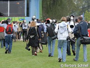 No, the day is not finished yet! Off they go to the press center to download and organize thousands of photos to meet deadlines.