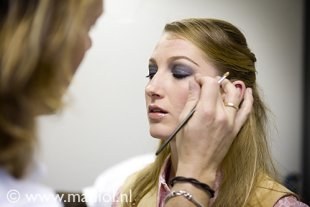 Marlies van Baalen getting her make-up done