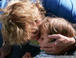 Sjef Janssen cuddling with his son Yannick Janssen van Grunsven