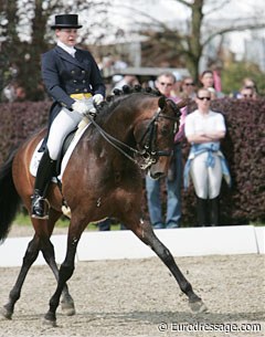Australian Hayley Beresford on the Lusitano stallion Relampago de Retiro. Beresford is working at Isabell Werth's stable in Rheinberg where she rides 8 horses a day. Isabell can be seen in the background.