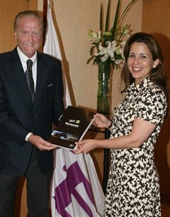 Paillot presenting Princess Haya the candidacy Book outlining the bid of Lower Normandy, Northern France, to host the 2014 World Equestrian Games.