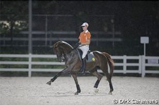 Hans Peter Minderhoud schooling Nadine at the 2008 Olympic Games :: Photo © Dirk Caremans