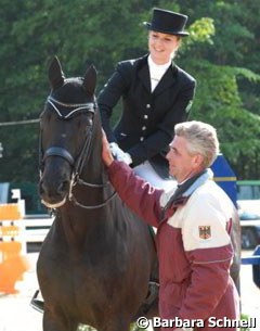 Thea Felicitas Muller on Highway and trainer Hans Heinrich Meyer zu Strohen by their side