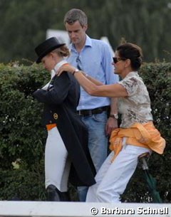 Coby van Baalen helping Marlies to get dressed for the prize giving