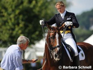 Coach Jan Bemelmans preparing student Ellen Schulten Baumer's Donatha before the test.