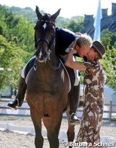 Matthias Alexander Rath getting congratulated by stepmom Ann Kathrin Linsenhoff