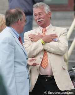 Stephen Clarke seems to be telling Freddy Leyman a funny story.