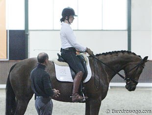 Steffen Peters teaches a young girl on a 5-year old Jazz x Rubinstein mare