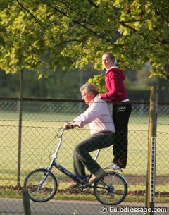 The day comes to an end. Paul Goris gives pony and junior rider daughter Noemie a ride