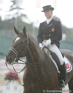 Portuguese Maria Caetano had to ride in the worst weather: pouring rain. Welcome to Britain!