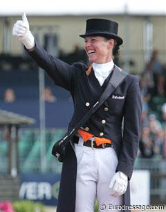 Cornelissen thanks her fans on the podium when she's about to receive her European Grand Prix Special gold medal