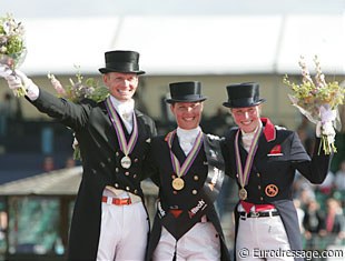 The Grand Prix Special podium at the 2009 European Championships: Edward Gal (silver), Adelinde Cornelissen (gold), Laura Bechtolsheimer (bronze) :: Photo © Astrid Appels