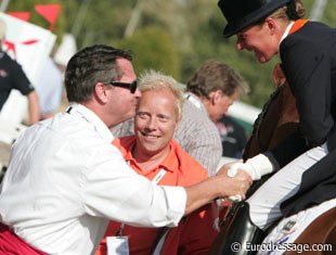 German team trainer Holger Schmezer congratulating gold medallist Adelinde Cornelissen