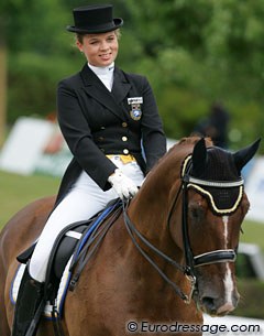 Swedish Sara Henriette Bergstrom Kallstrom on Diezel (by De Niro). She used the same trot music as Steffen Peters (Coldplay) and Alexander Rybak's Fairytale for the canter. The latter music was too quite for Diezel's big canter