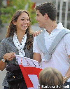 Swiss Sophie Aiko Muller sharing a laugh with a friend of a team rider