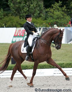 Charlott Maria Schurmann and the 17-year old licensed Hanoverian stallion World of Dreams. Great half pass!