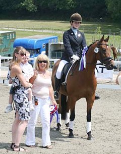 Lucy Pincus and Sheepcote Sandmartin receive their prize from show organiser Gloria Leverett and cancer survivor, 4 year old Tommy :: Photo © Simon Battram
