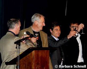 Champagne for the Spanish team: Jan Bemelmans (team trainer), Juan Manuel Munoz Diaz (Fifth in the WEG Kur) and team member Jordi Domingo