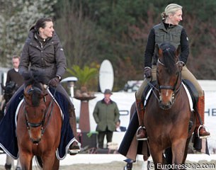 Lyndal and Kristy Oatley chatting while walking their horses
