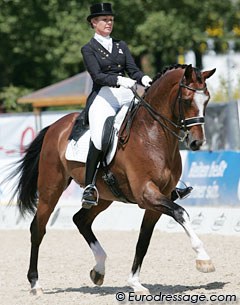 Beautiful ride by Anne van Olst with lots of highlights but she did not show any piaffe!! Did I miscount? I didn't see them do more than 2/3 steps on any of the three spots in the test and the judges kept scoring the movement up to a 6? Dyscalculia ?