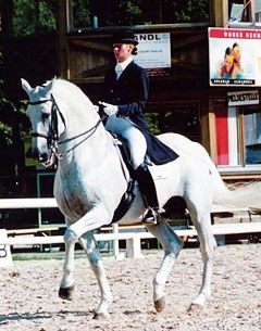 Zsofia Dallos competing her father's stallion Aktion