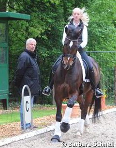 Jill de Ridder schooling Charmeur (by Carabas). Father Ton de Ridder supervises