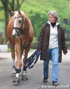 Jessica Krieg's trainer Stefanie Meyer-Biss walking Danilo