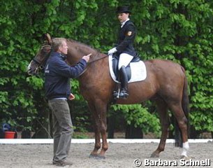 Charlott Maria Schurmann and her trainer Oliver Oelrich discuss her ride