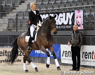 Wolfram Wittig helping his wife Brigitte ride Biagotti W (by Breitling x Diego xx)