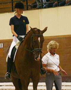 Dressage trainer Marianne Essees Söderberg from Strömsholm working on the position of the rider