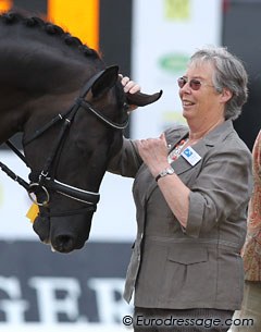 Judge Jennie Loriston-Clarke gives champion Astrix an ear rub