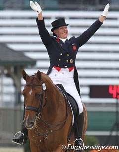 Fiona Bigwood is ecstatic about her ride and waves to the crowds. The grand stand was quite full on the first day of dressage competition. The bleachers stayed empty with all the rain. No problem, because the atmosphere was certainly there