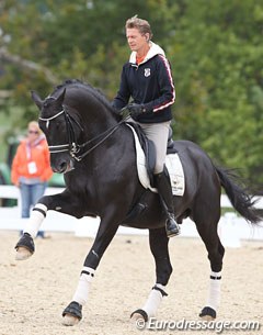 Edward Gal schooling Totilas; Nicole Werner watching in the background :: Photo © Astrid Appels