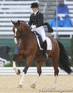 Riding as an individual for Ireland: Judy Reynolds on Remember. They were riding in the middle of a major rain shower