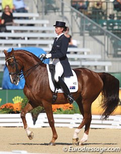 Australian Rachael Sanna on Jaybee Alabaster. The horse has an inexpressive front leg, especially in trot, but Sanna did her best to get the most out of her mount. Solid canter work pulled the score up to 67.000%